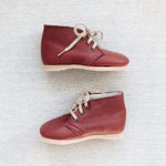 lace-up leather boots in burgundy leather